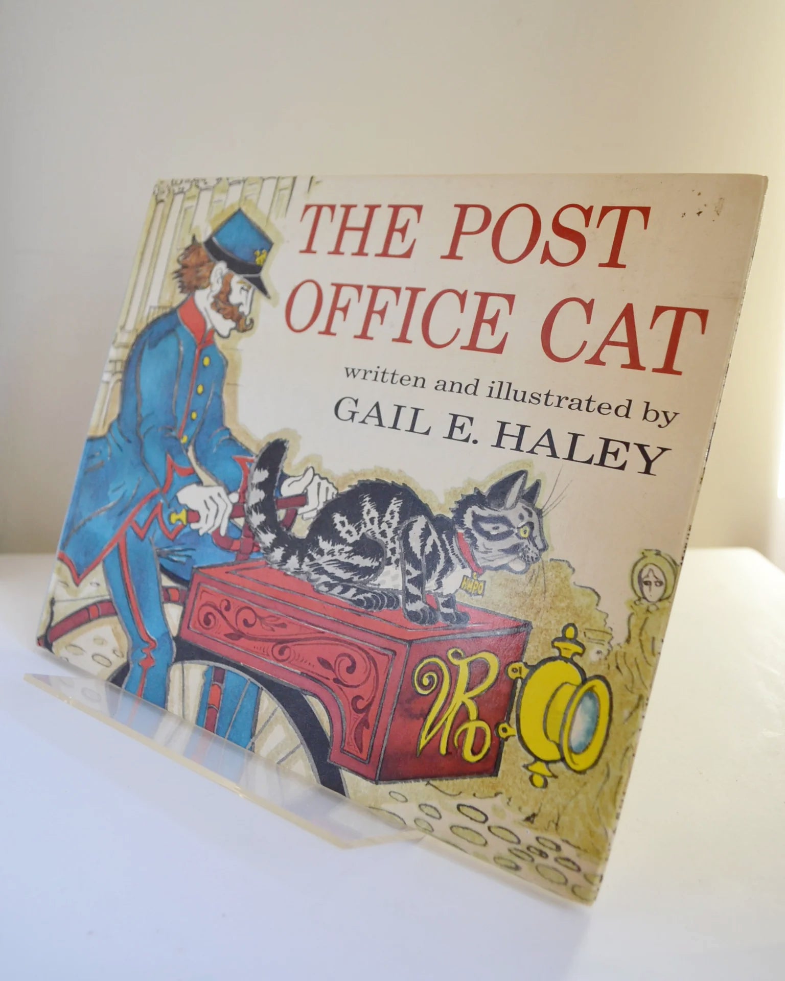 The Post Office Cat Written and Illustrated by Gail E. Haley